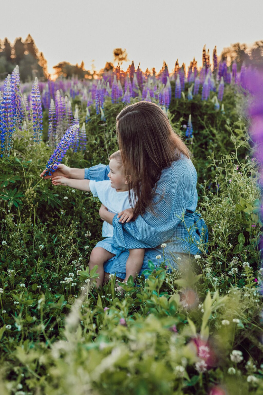 woman child outdoors natural activities flowersa