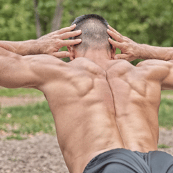 A List of the Best Lower Back Exercises for Bodybuilding a man performing the superman for lower back strength.