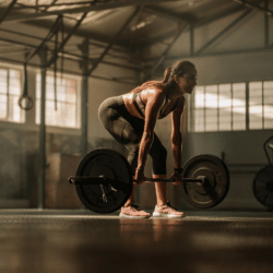 Weight Lifting for Weight Loss - Woman performing the barbell deadlift