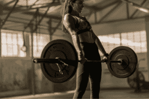 Woman completing a deadlift