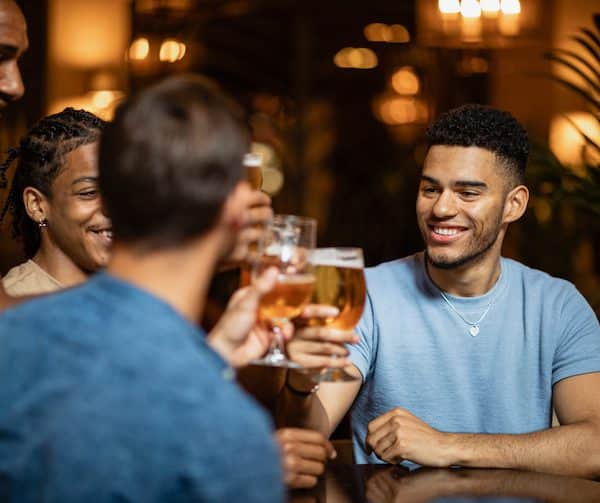 people smiling drinking alcohol  socially