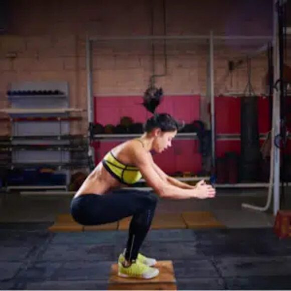 woman box jump exercise. Muscle Plateau