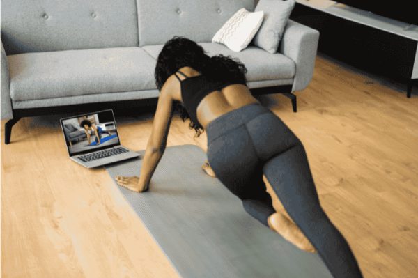 Best Guide to Healthy Habits for Physical and Mental Health black woman home workout bodyweight online trainer