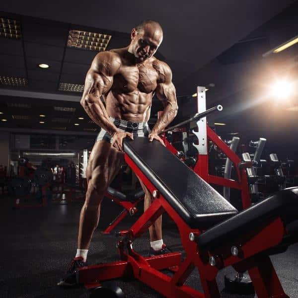 muscular-man-getting-ready-to-perform-a-superset