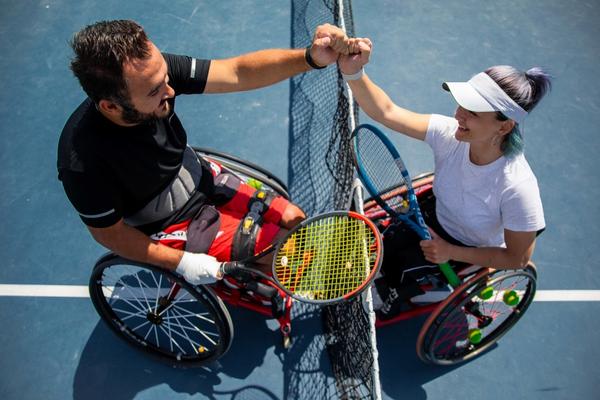 Fitness Tips for People With Disabilities, man and woman playing tennis