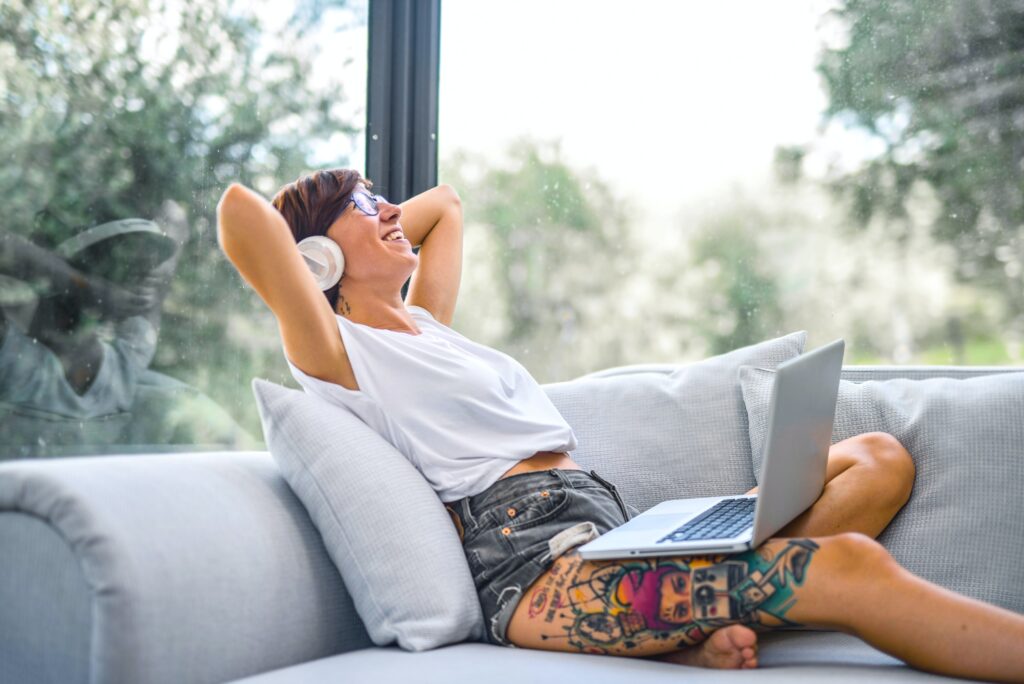 relieve stress 7 ways to relieve stress and burn calories for remote workers. woman relaxing on a chair.