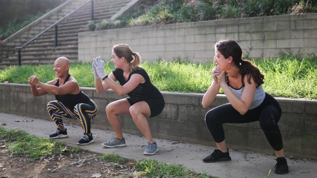 women, deep squat, primal squat, outdoor exercise, 