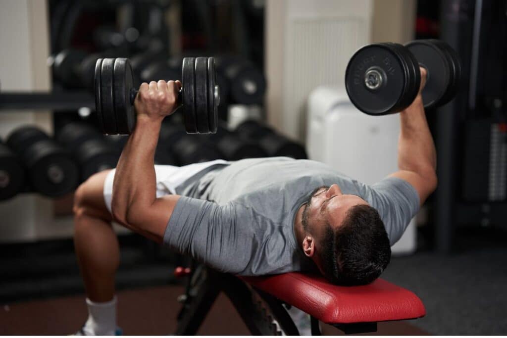 Building Muscle with Dumbbell Bench Press: A Comprehensive Guide