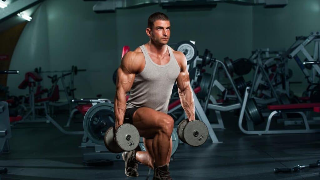 Muscle Man Reverse Dumbbell Lunges