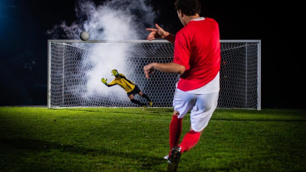 Soccer Player Shooting At Goal